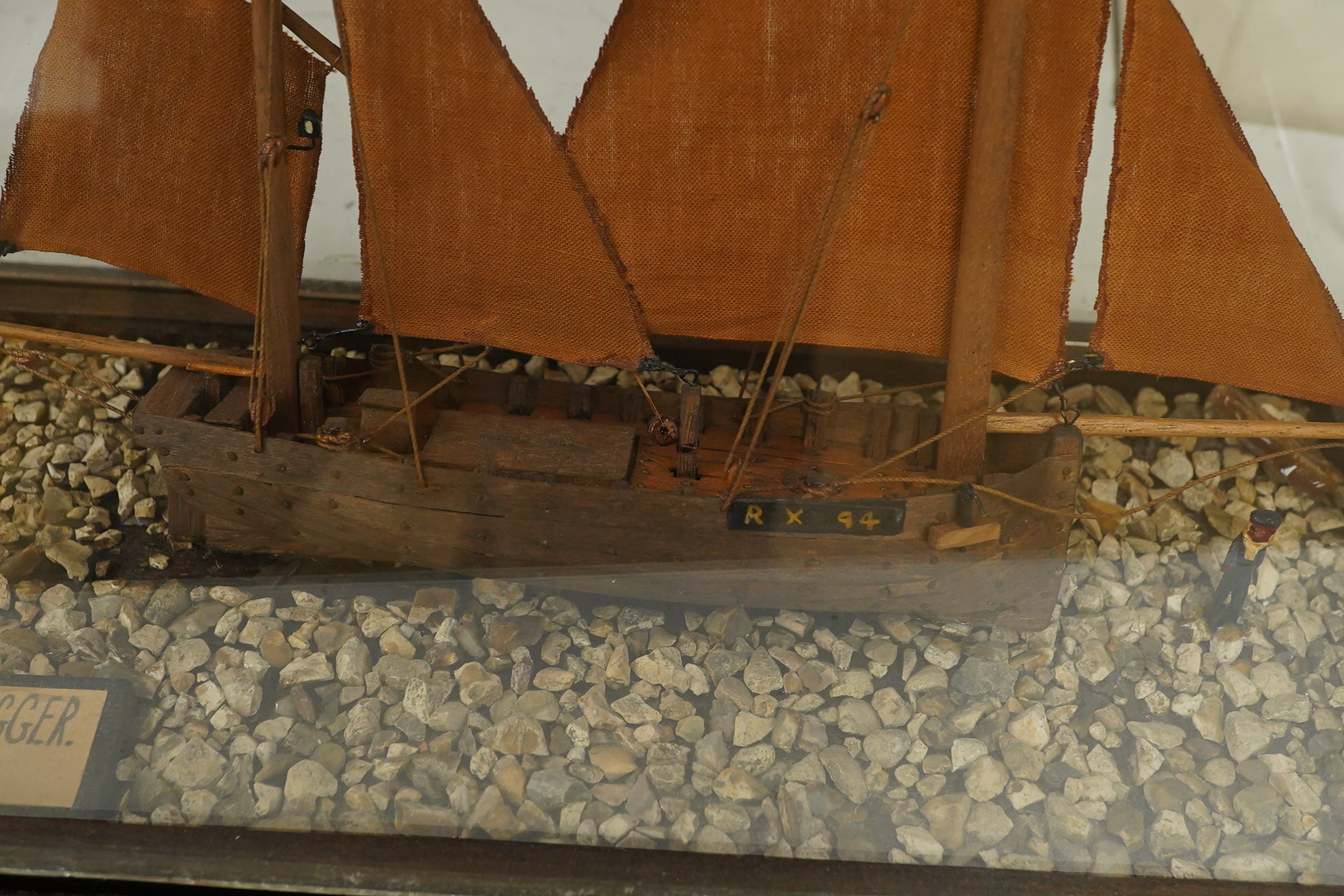 A cased scratch built model of a Hastings lugger of 1870, 40cm wide